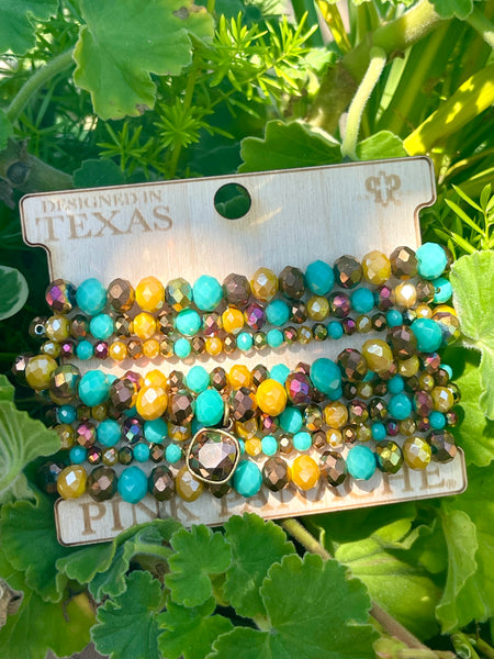 Nine strand faceted bead bracelet set with Austrian crystal