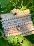 Nine strand bracelet stack with Austrian crystal