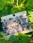 Nine strand faceted bead bracelet set with Austrian crystal