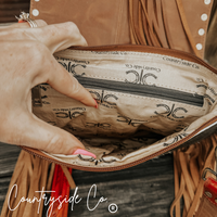 Chisholm Trail Cowhide Purse With Tooled Leather